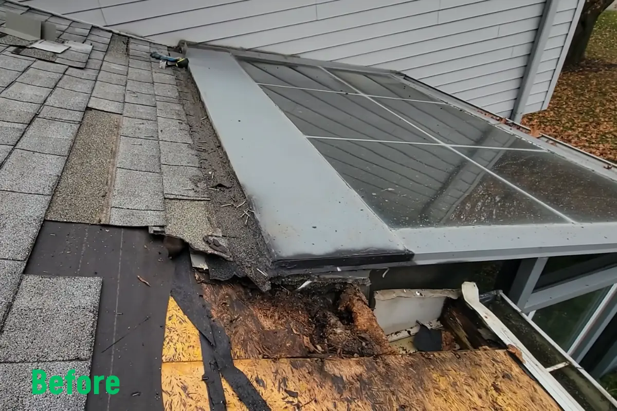Before repair: damaged shingles and exposed deteriorated roof decking beside a sunroom roof junction in Sunnyvale